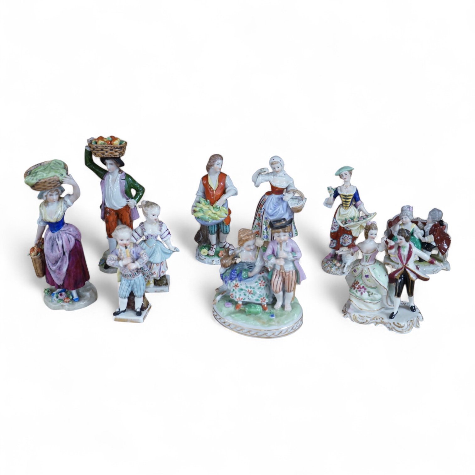 A collection of ten German and English porcelain figures and figure groups, mainly late 19th century, to include Dresden, largest 17cm high